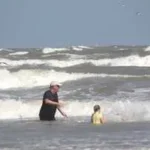 Galveston Island Texas Playing in the Surf