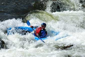 Kayaking the Roaring Fork River near Snowmass in Colorado